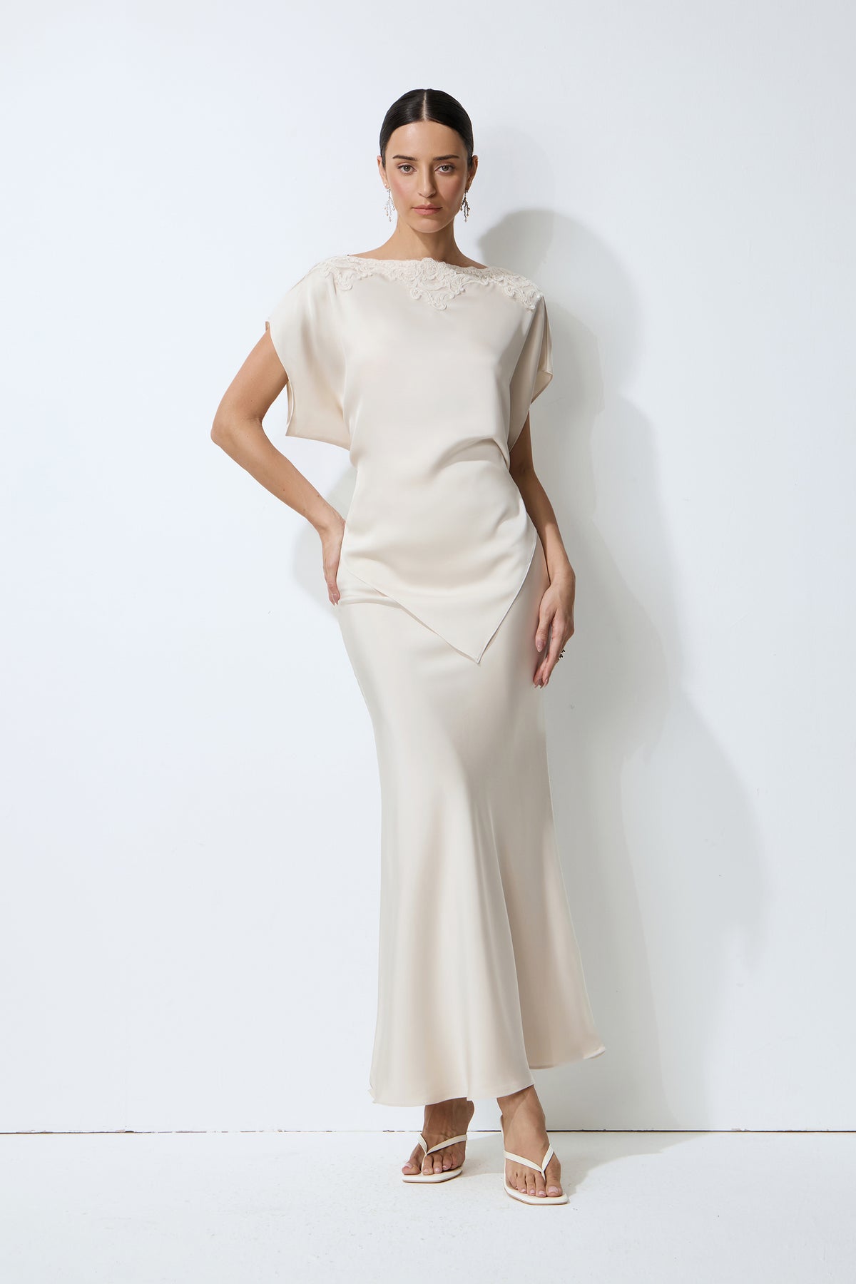 Purely Elegant Beige Lace-Trim Asymmetric Satin Top & Skirt Set