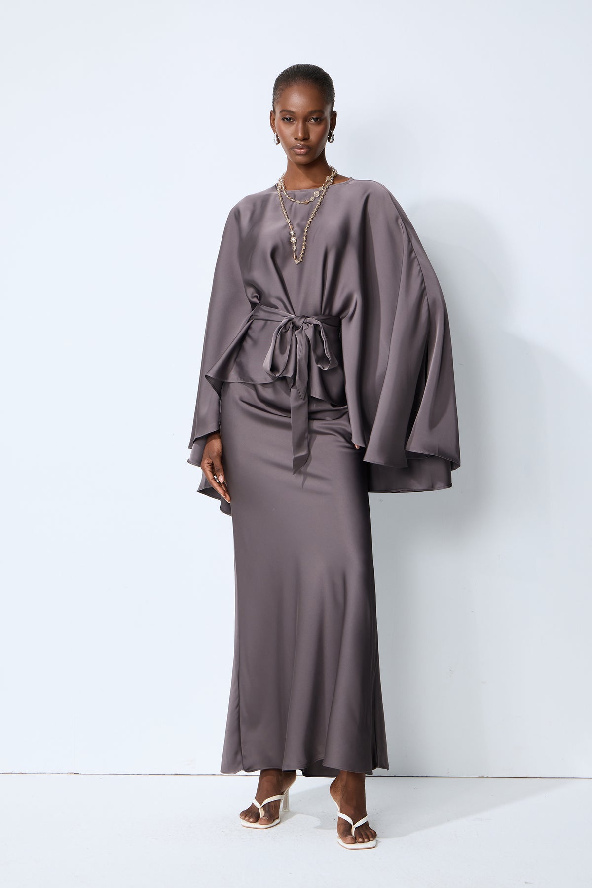 Exceptionally Graceful Grey Satin Cape Sleeve Top & Skirt Set