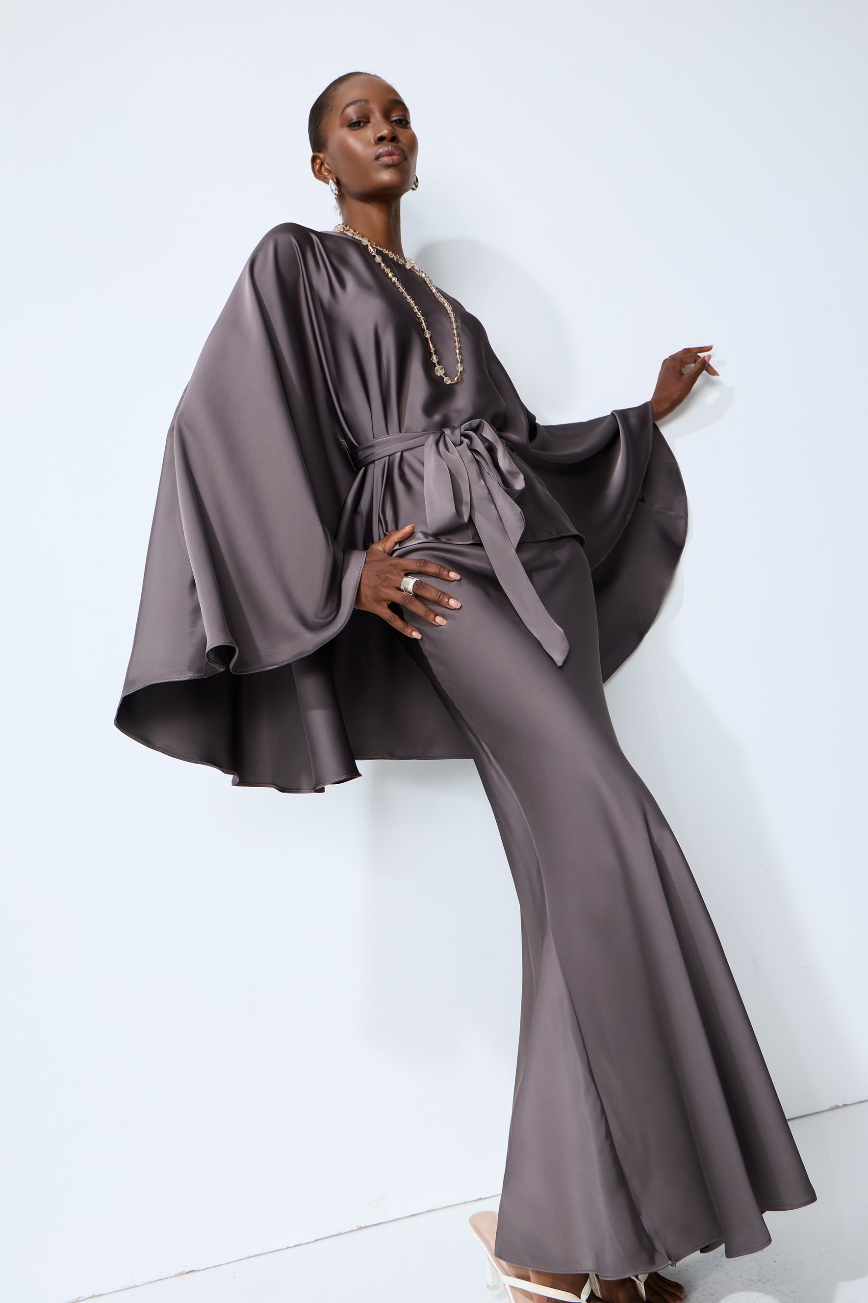 Exceptionally Graceful Grey Satin Cape Sleeve Top & Skirt Set